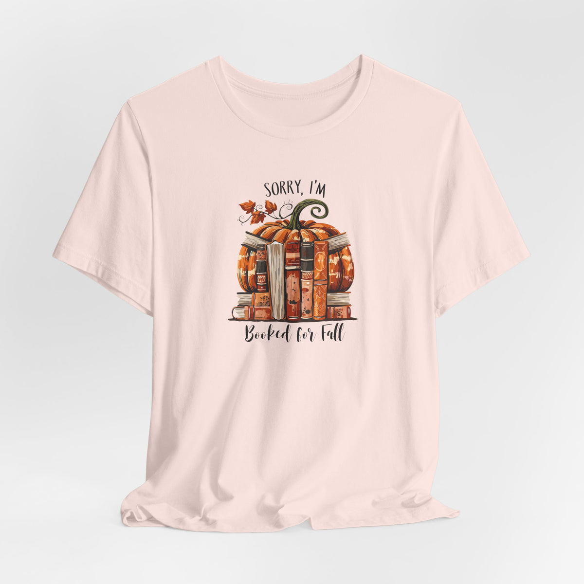 Sorry I’m Booked for Fall T‑Shirt — Autumn Pumpkin & Stacked Books Graphic Tee